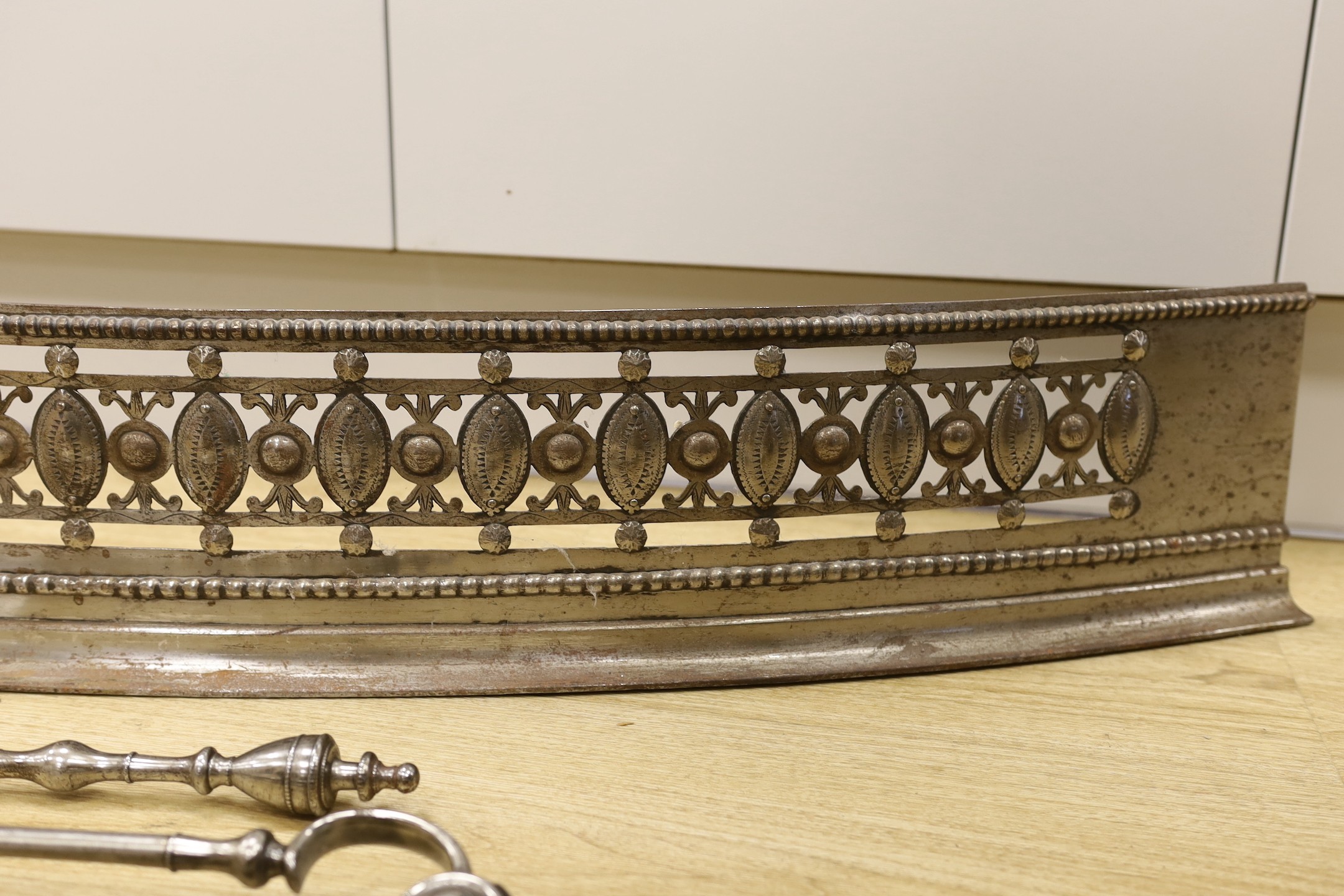 A suite of fireplace furniture comprising of a basket, fender and tools